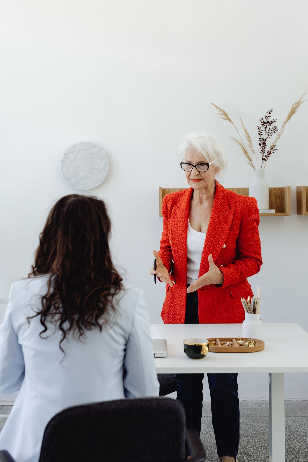 Business coach mentoring an SME owner during a strategy coaching session