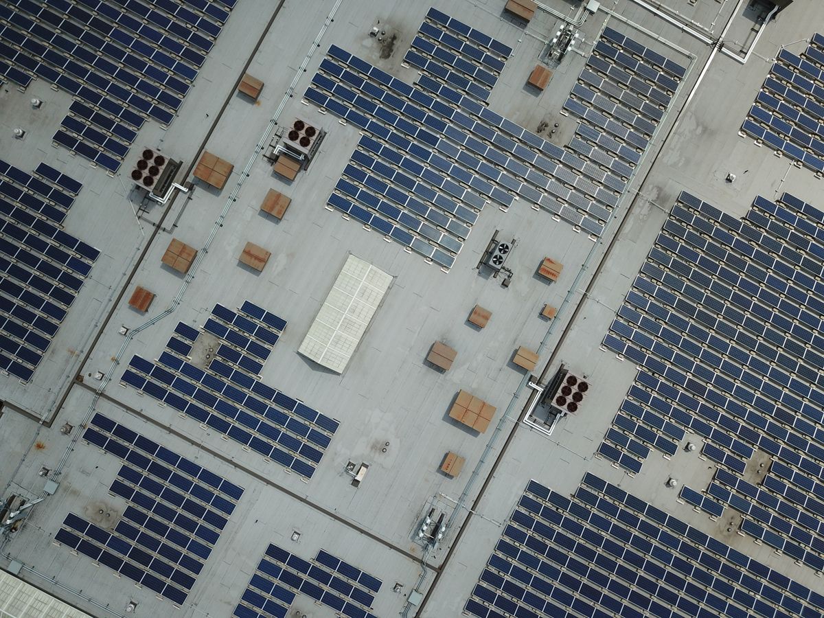 Solar panels installed on a school rooftop providing clean energy